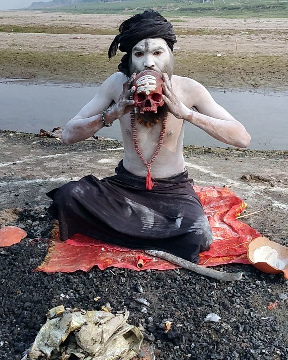 Sadhu with marigold garlands on the ghats of Varanasi